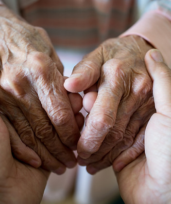 young hands holding old hands